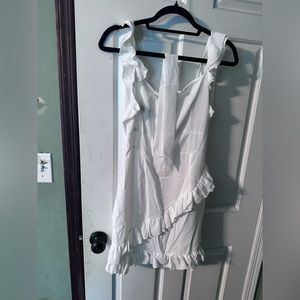 White ruffled mini skirt